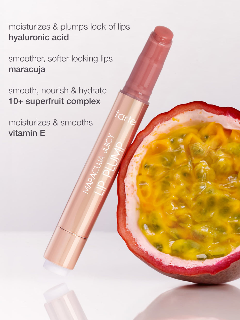A Tarte Cosmetics Maracuja Juicy Lip Plump sits next to a halved passion fruit. Text highlights benefits: moisturizes & plumps lips, hyaluronic acid, maracuja, 10+ superfruit complex, vitamin E.
